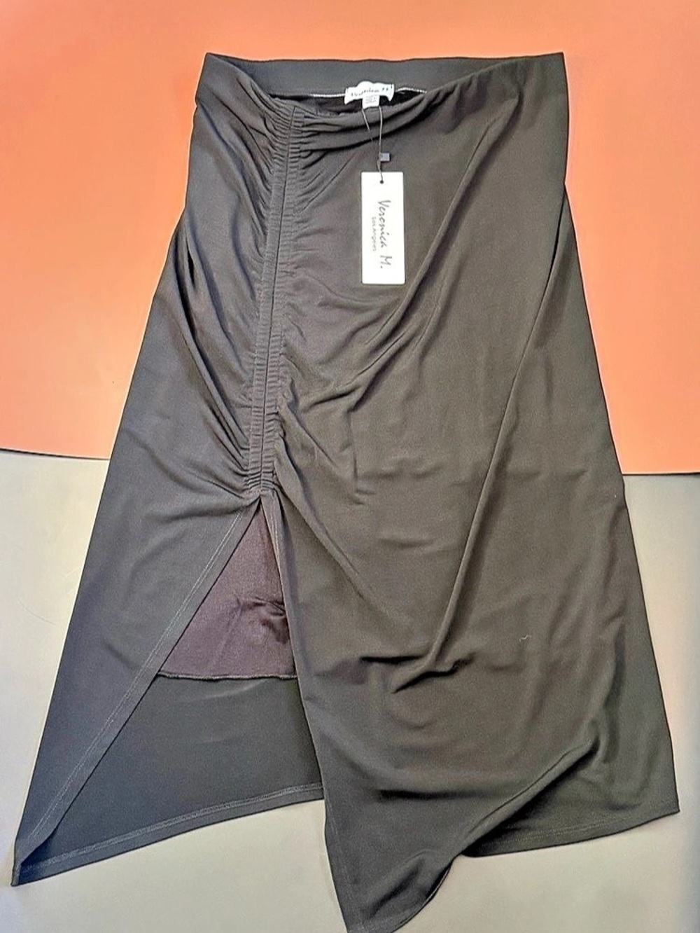 Veronica M. Shifted Slit Skirt. Midi in Black Size Medium